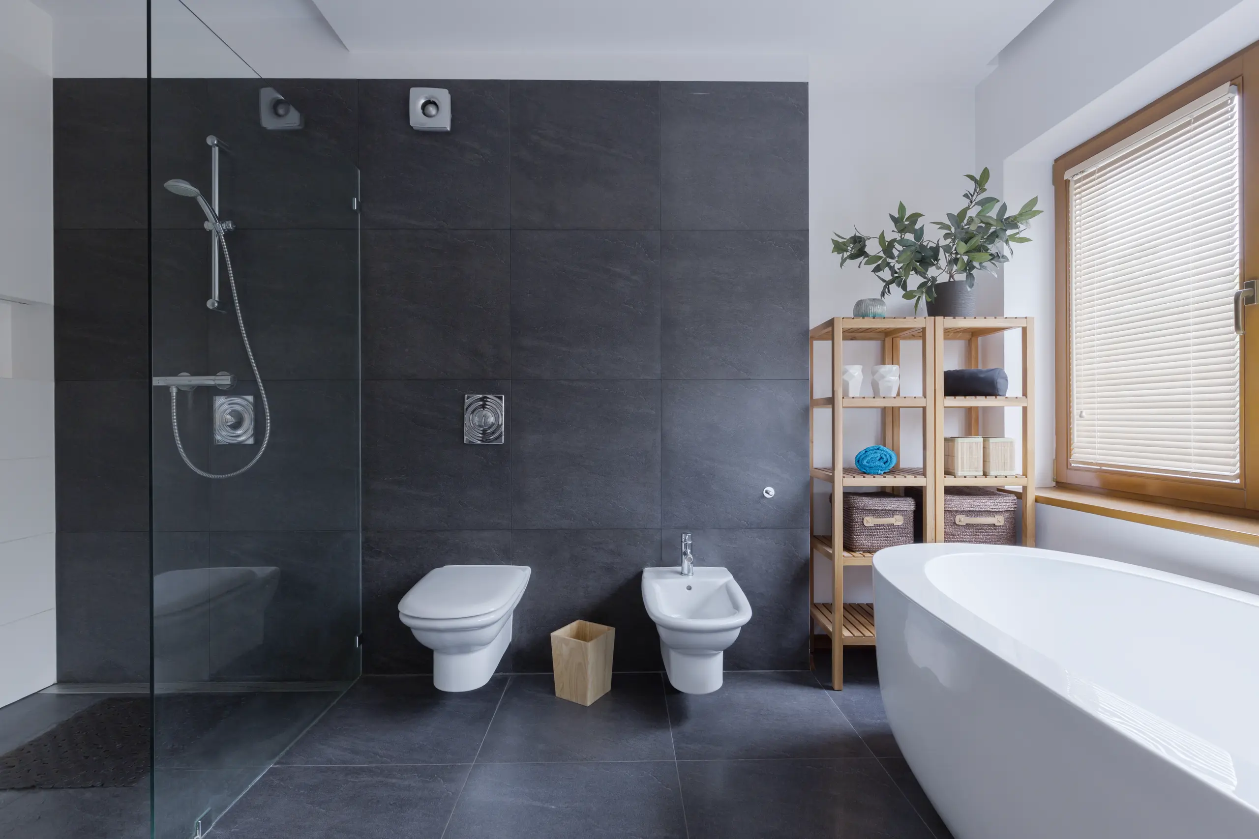 Modern bathroom with walk-in glass shower, wall-mounted toilet and bidet, freestanding tub and wooden shelving Full Bathroom Remodel